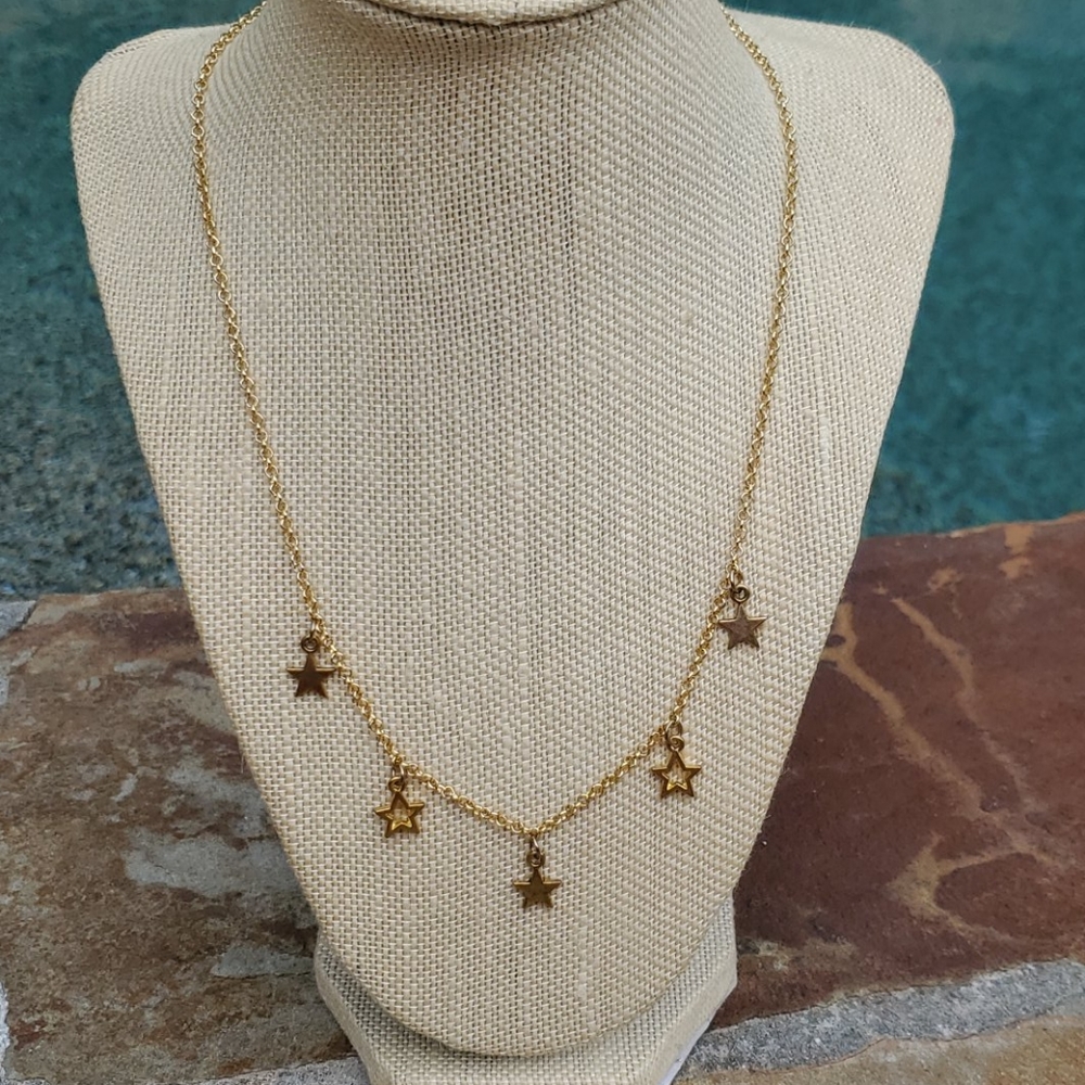 Gold plated necklace with Star Charms.